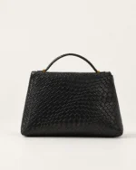 Vista traseira da Bolsa Satchel Estruturada demonstrando o padrão contínuo de tressê.