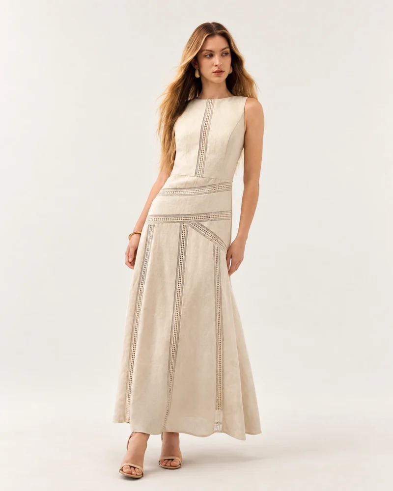 Vestido midi em linho evasê com vazados ajour areia — frente